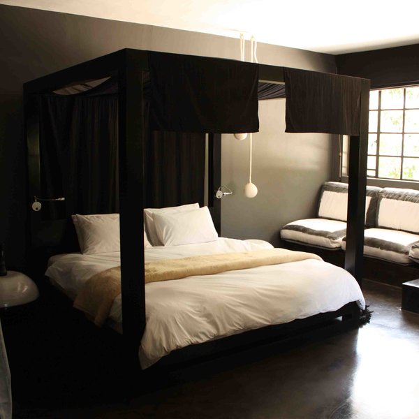 The bedroom has a king-size bed