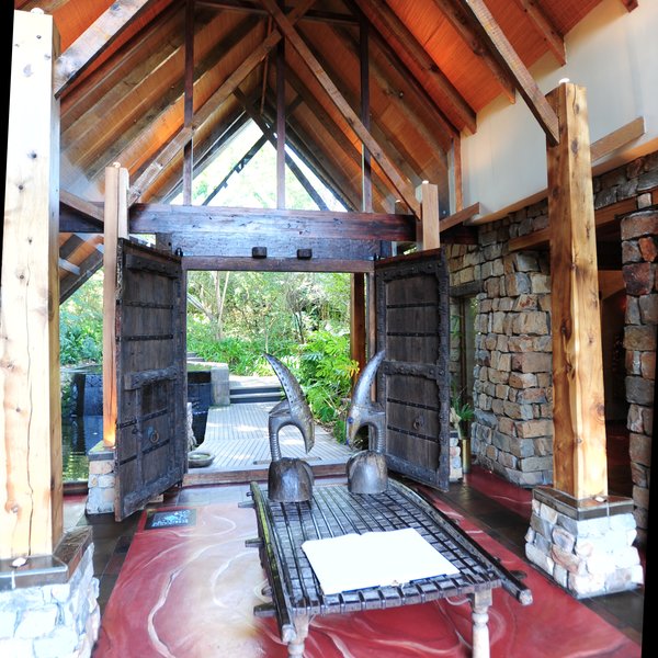 The main entrance is built in stone supported by blackwood columns