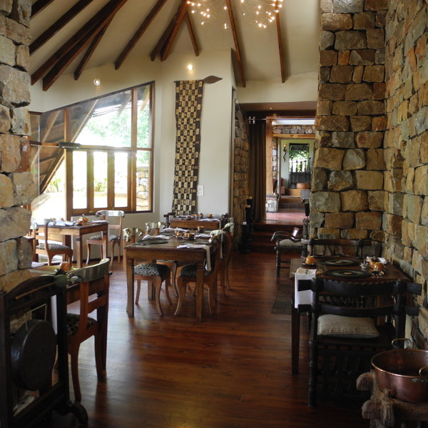 ... and has glass walls and is decorated in wood, stone and leather.