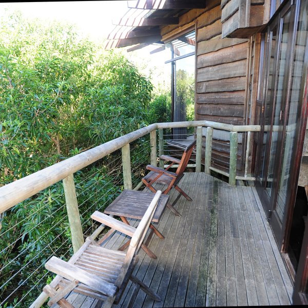 The lounge leads onto a private veranda ...