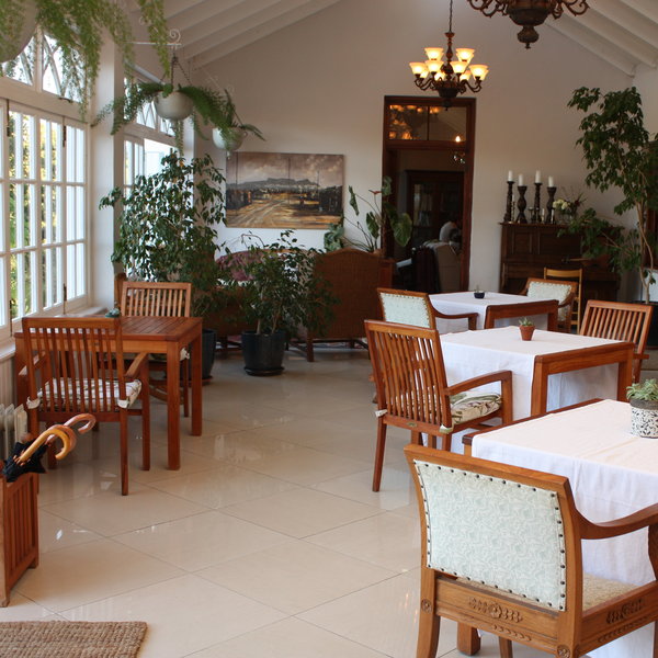 Enjoy breakfast in the conservatory-style restaurant...