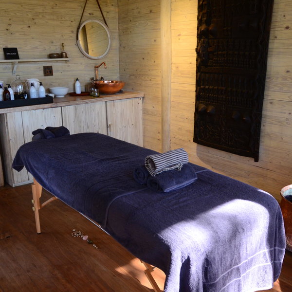 Nice extras include a spa room with a massage bed...