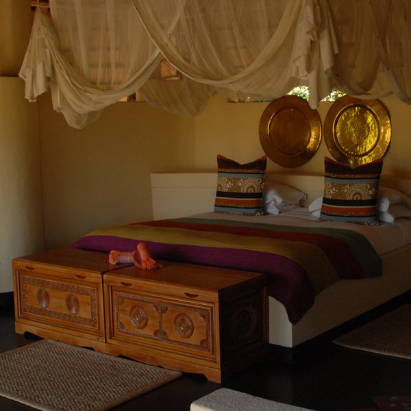 The bedrooms are beautiful, with comfortable beds and large mosquito nets.