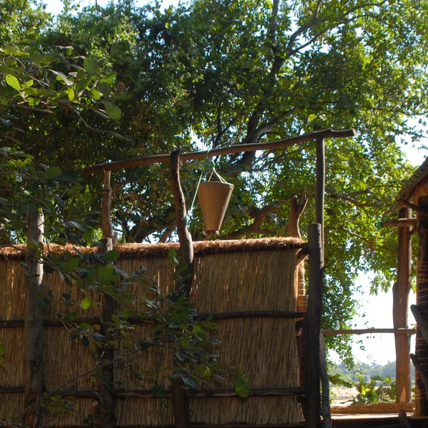 ...with a suspended bucket shower...
