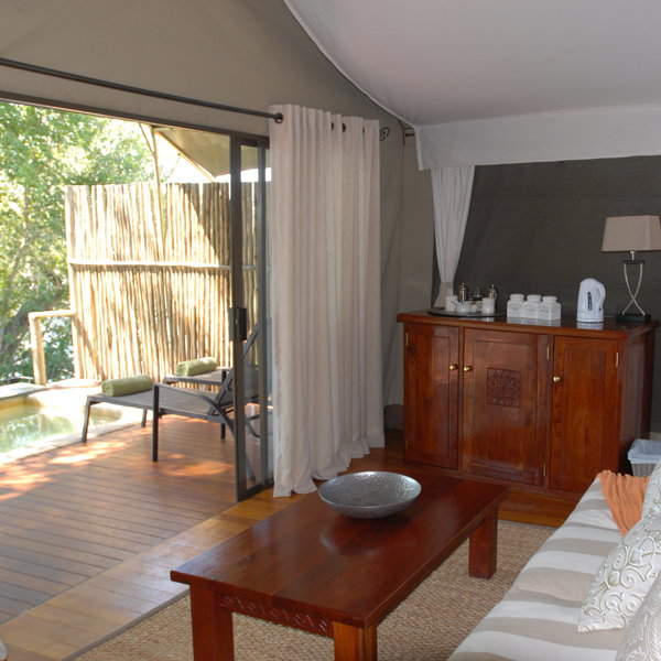 ...and a lounge area with a tea and coffee making station as well as a mini-bar