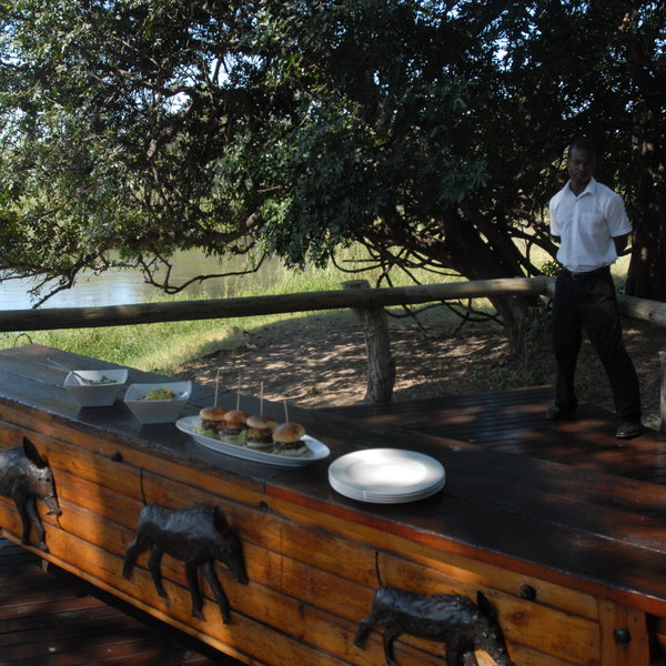 Meals are often served outside at Zambezi Sands.