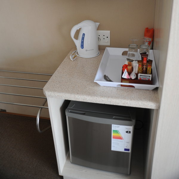Each room has a fridge and a tea/coffee station…