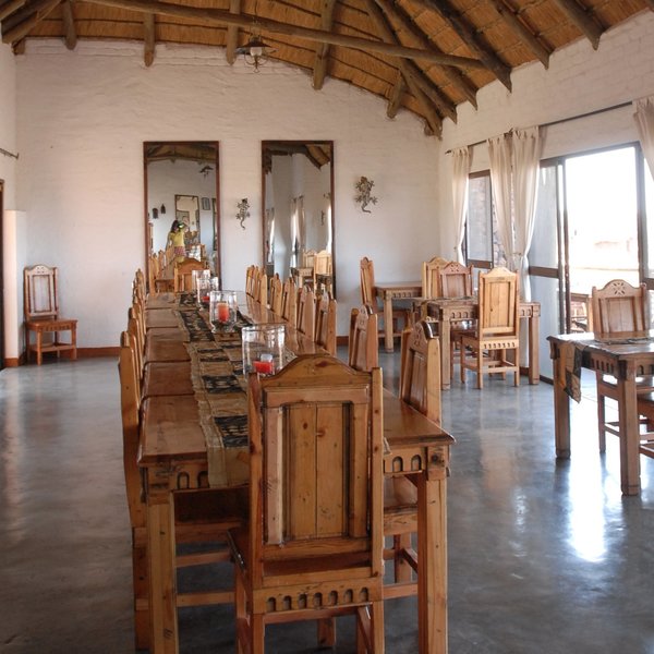 You can enjoy your meals at the dining room in the main area...