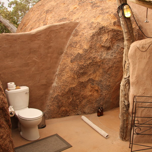 Beside each room is an open-air bathroom...
