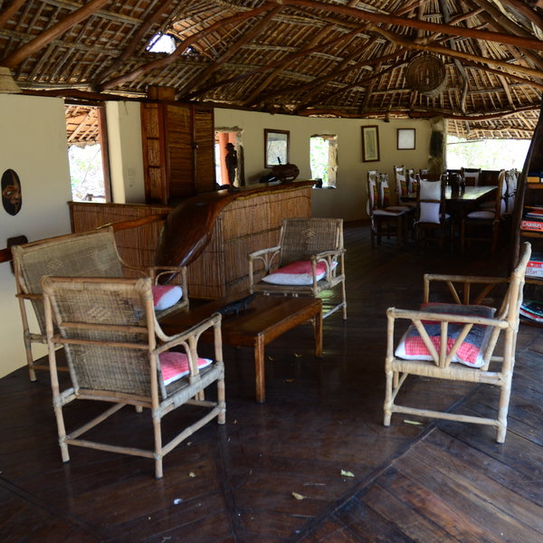 …which has a comfortable seating area and a well stocked bar.