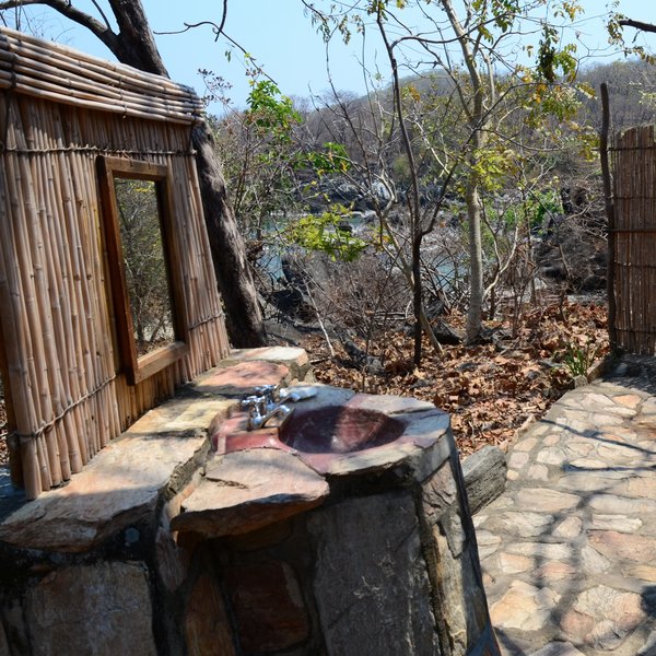 The en suite bathrooms blend in to the surrounding landscape…