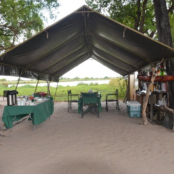 The guests and guide come together under the main tent to enjoy the meals,….