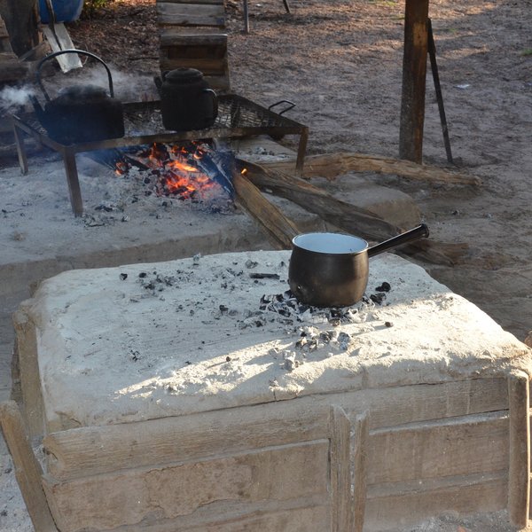 … over an open fire and in a ‘ground oven’.