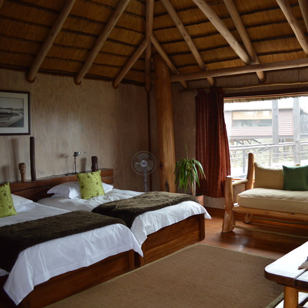…they have thatched roofs and small balconies overlooking the riverbed.
