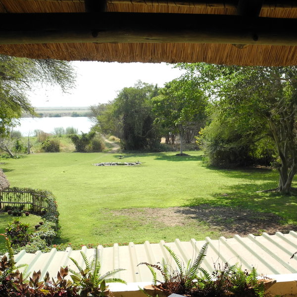 … both with views over the lush gardens that lead down to the river.