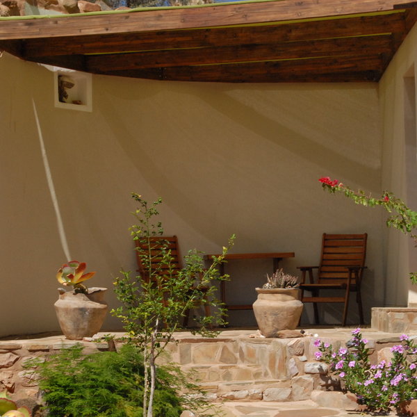 The small courtyard garden offers enough sitting options to relax…