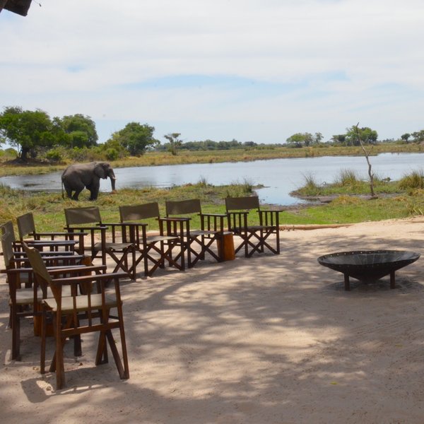 The central area has open views over a lagoon, and an inviting firepit around which to gather.