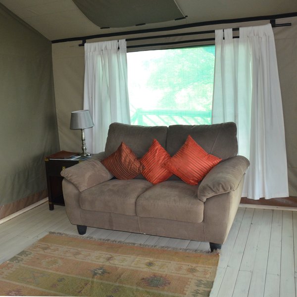 Each chalet also has a comfortable lounge area to relax in, as well as...