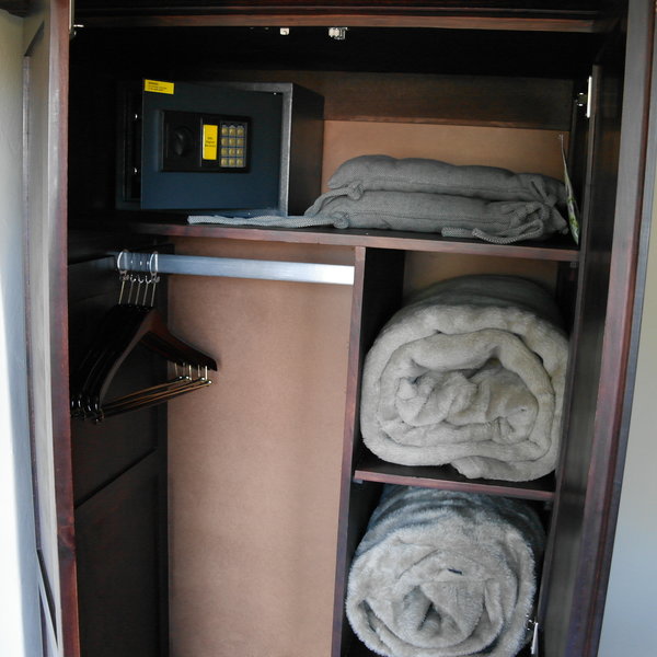 …as well as a wardrobe which also includes a small fridge and a safe.