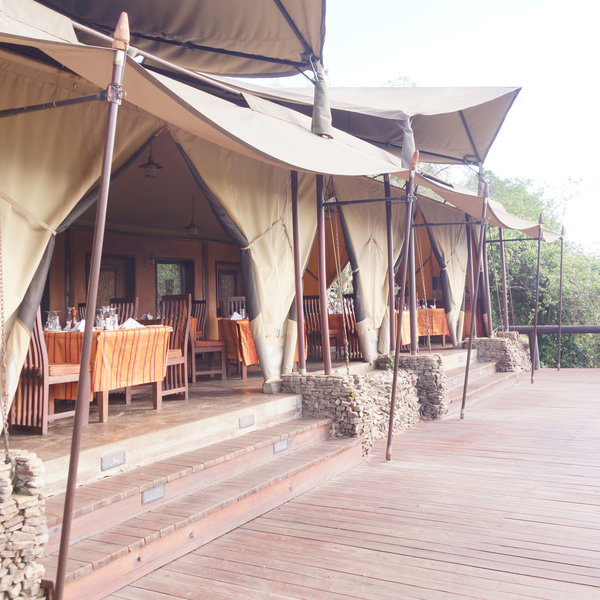 The reception and lounge area are furnished in a rustic but stylish design.