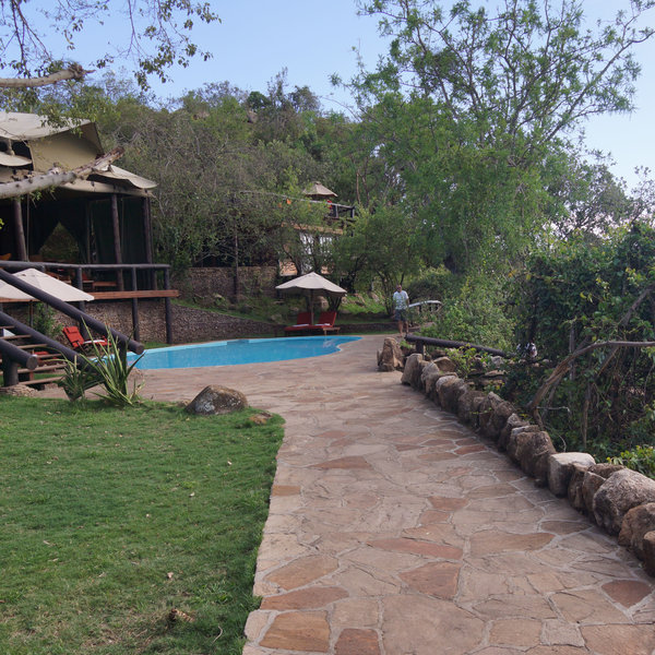 In front of the lounge area, there is also a good-sized pool…
