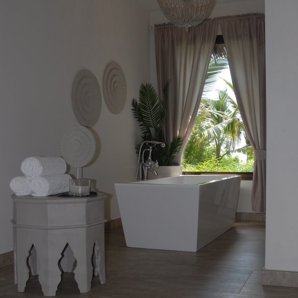All of Zawadi’s bathrooms feature rain showers and a freestanding bathtub.