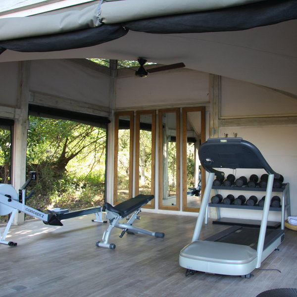 There is also a small gym behind the pool.