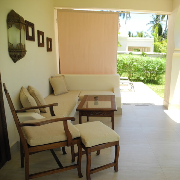 Outside there is a veranda with comfortable chairs.