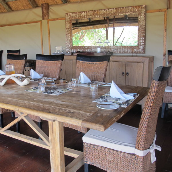 On one side of the main area is the dining table...