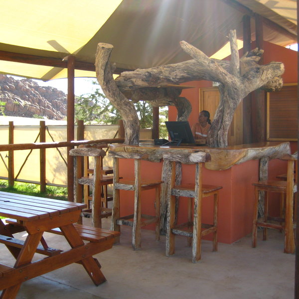 In the main area there is a covered bar offering shade from the sun…