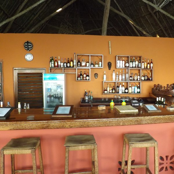 Have a drink at the pool bar...
