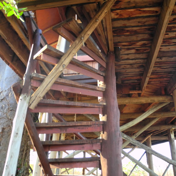 ... up an outdoor spiral staircase.