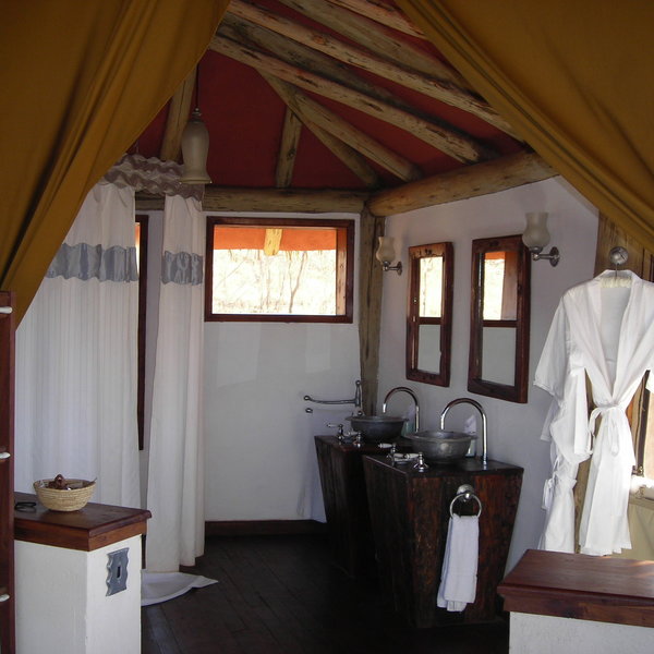 To one side is the en-suite bathroom...