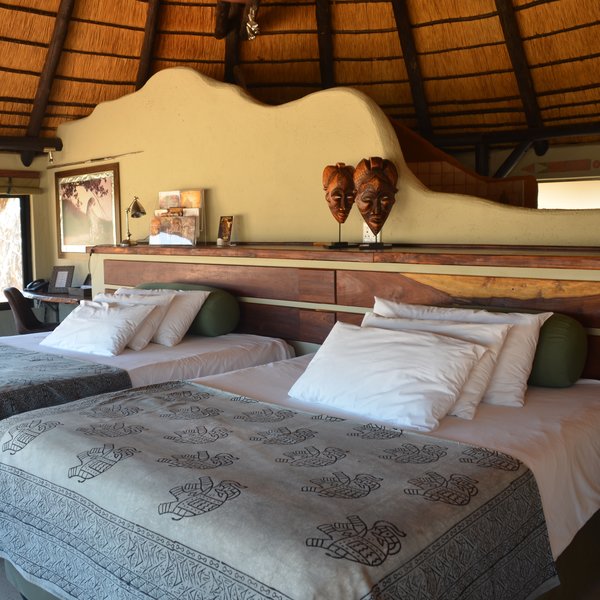 The bedroom is connected and there are large king-sized or twin beds....