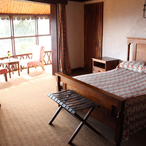 We especially liked the chairs that sit at the front window of each room…