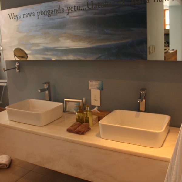 Each en-suite bathroom has double basins ...
