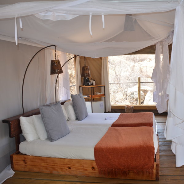 The rooms are very comfortable with mosquito nets around the beds.
