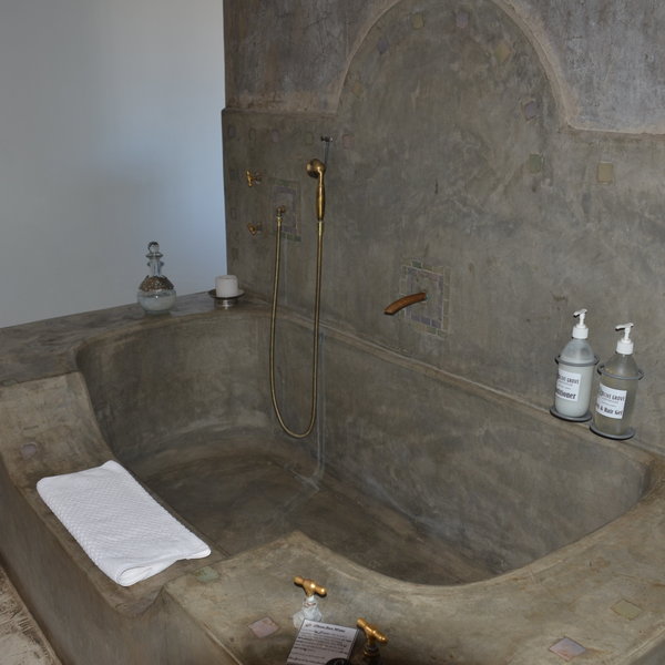...while the larger rooms also have a bathtub.