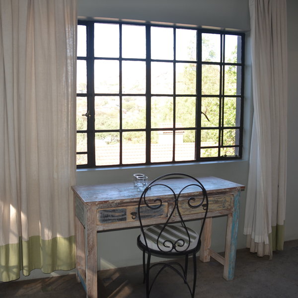 The one executive suite also has a rustic writing desk...