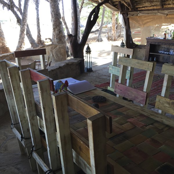 … a rustic, communal dining area…
