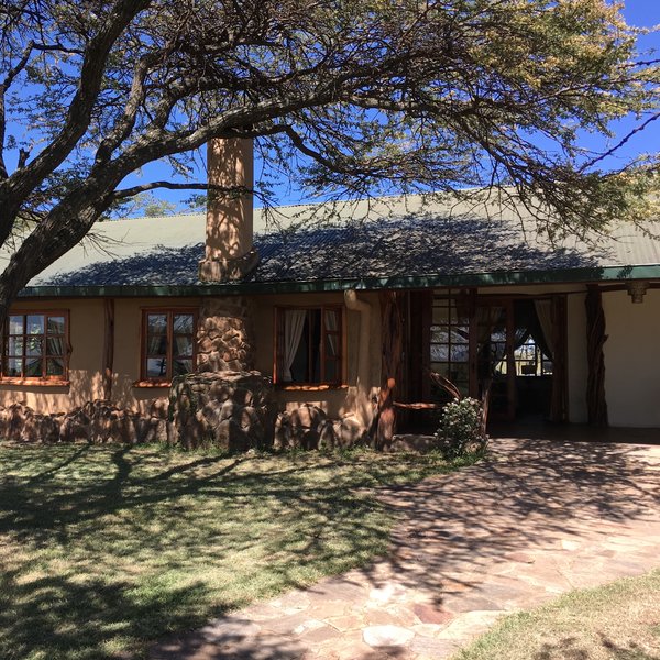 …set on the savannah amid acacias…
