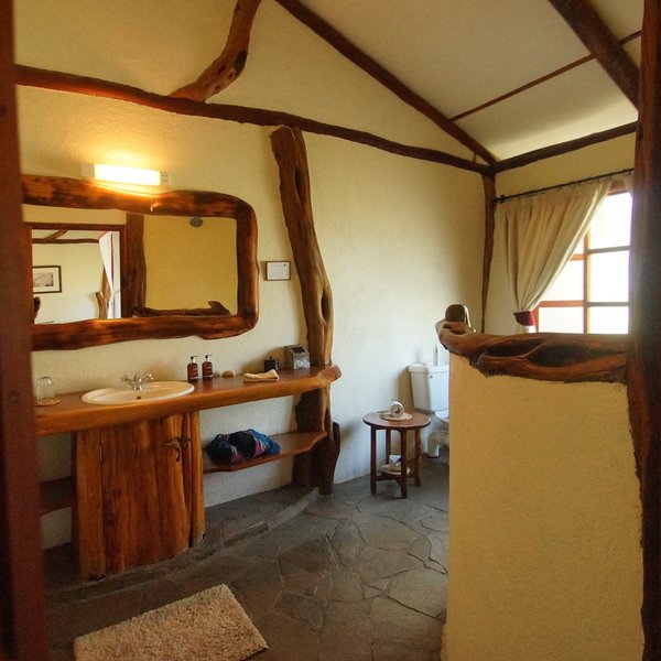 …and also has a roomy, rustic ensuite bathroom.