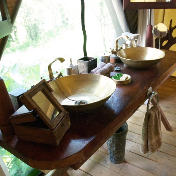 The stylish ensuite bathroom has twin wash basins...