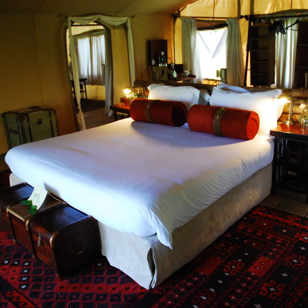 Each tent has a spacious bedroom with twin or double beds...