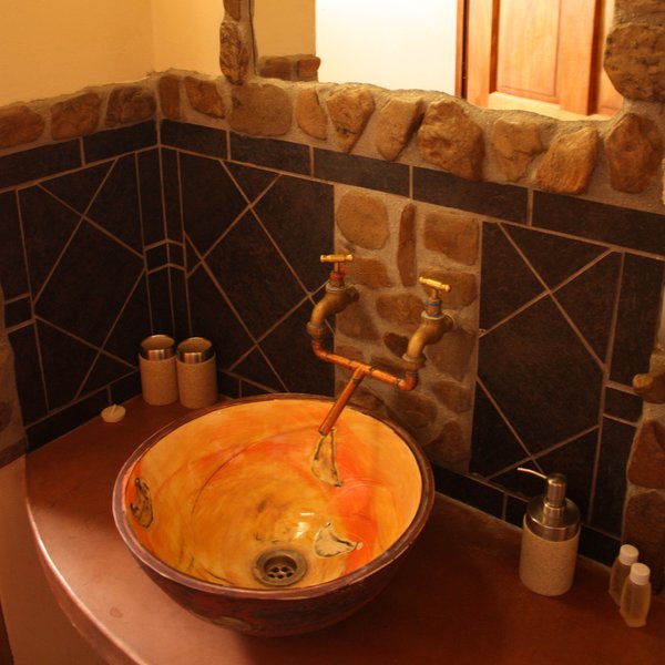 ...with colourful wash basins...