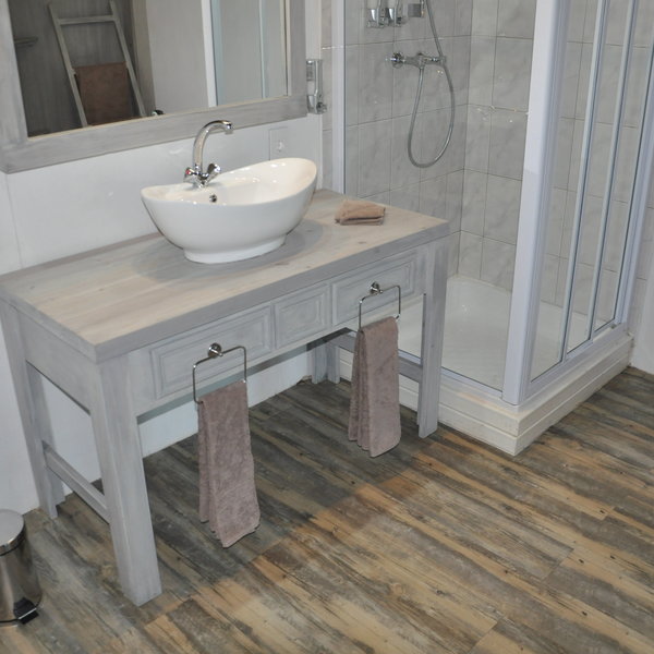 The bathrooms are relatively simple but functional with a toilet, sink and shower cubicle.
