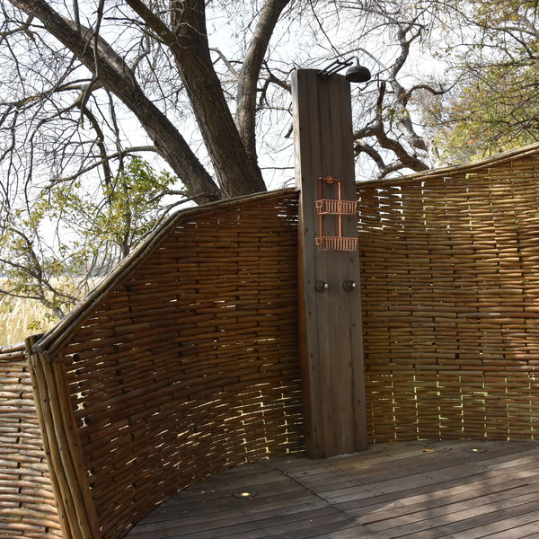 Each chalet has split level outside space with an outside shower on the upper level and...