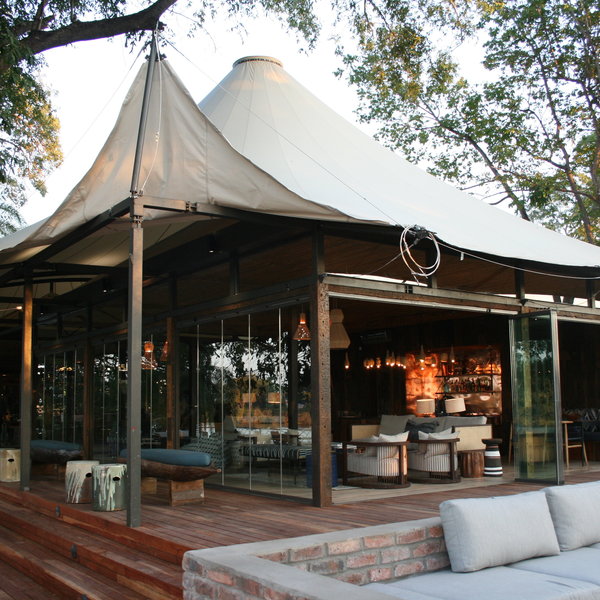 The main area sits under a vast African-style stretch tent …