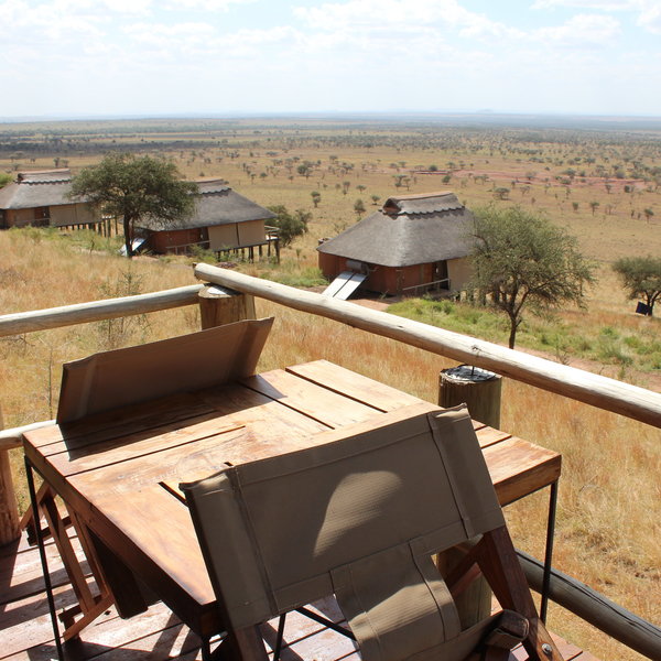 Each room features a balcony offering wonderful views over the Serengeti.