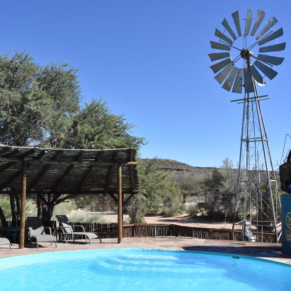 Outside there is a welcoming pool...
